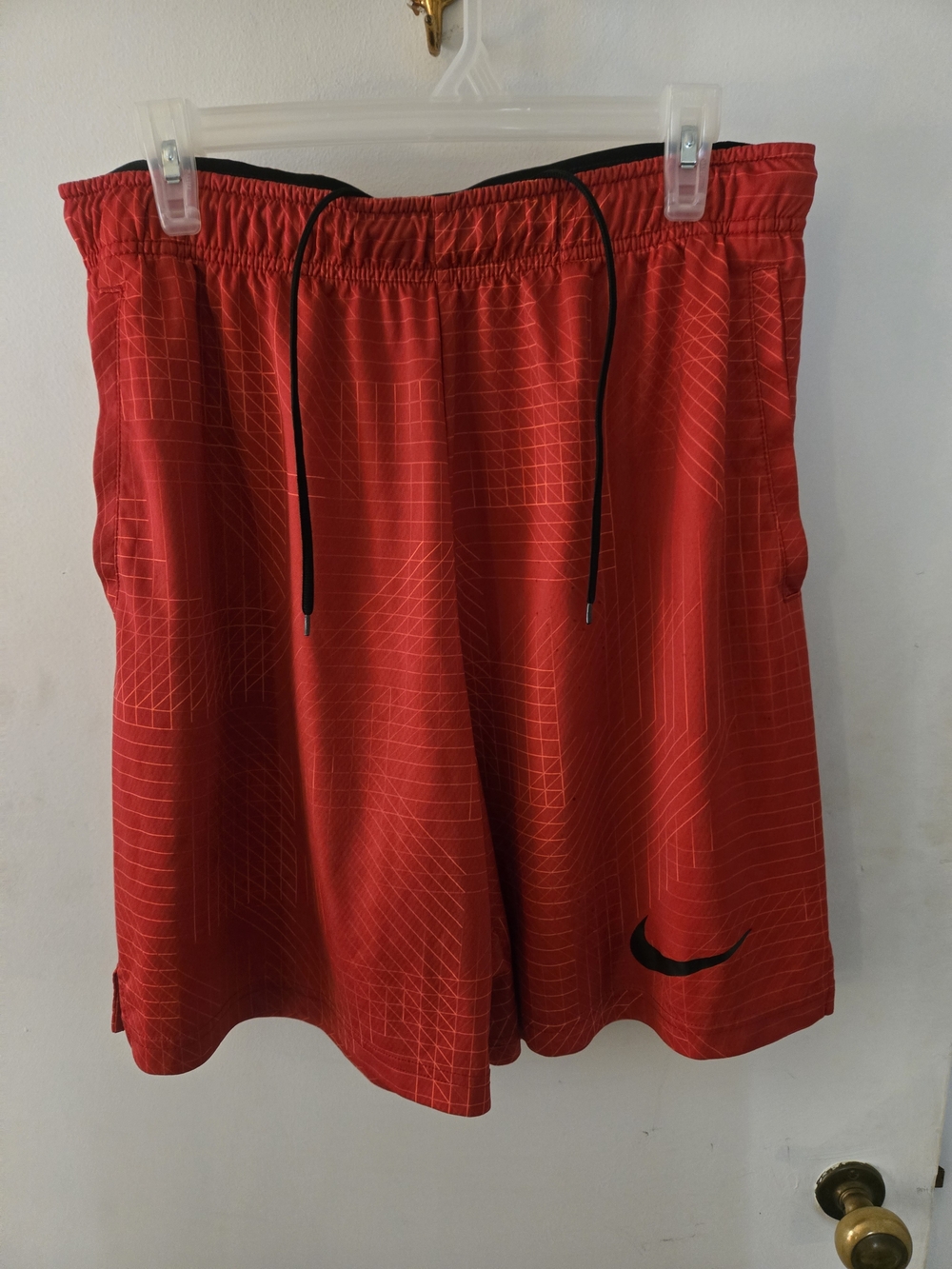 Nike Men’s Red/Orange Athletic Shorts with Black Trim and Swoosh